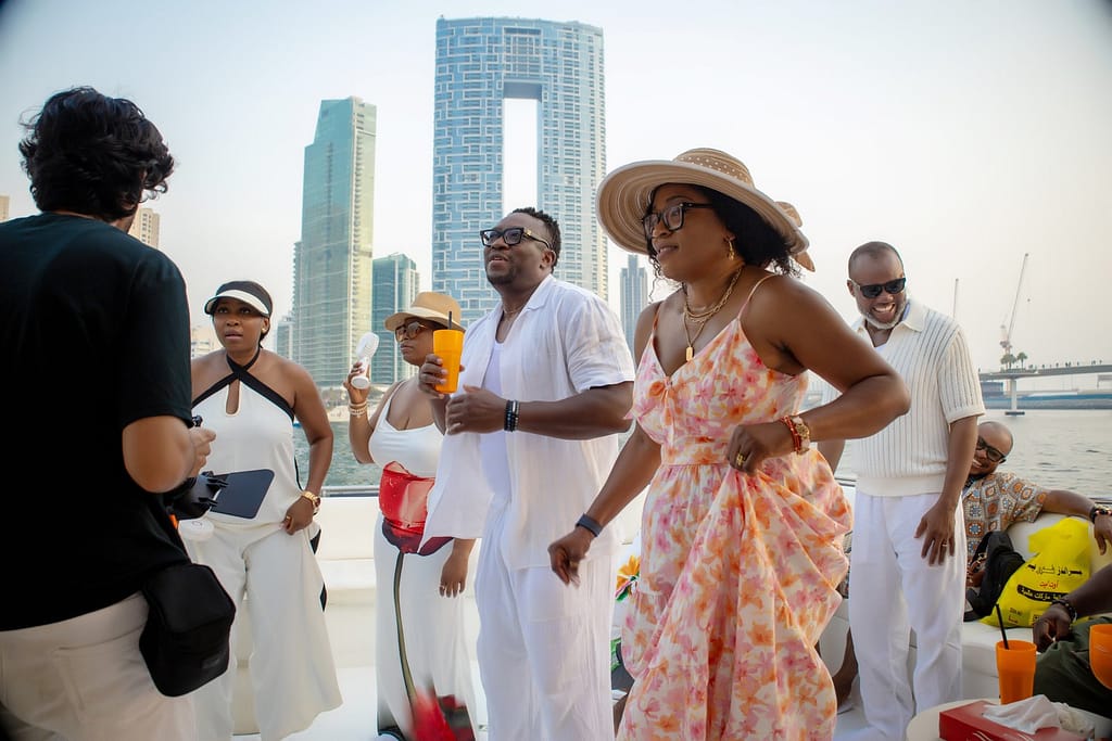 Guests on a yacht at Mr OZ's 50th birthday party
